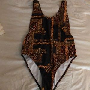 Misguided one piece bathing suit